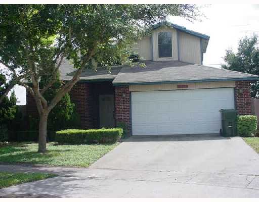 a front view of a house with a garage