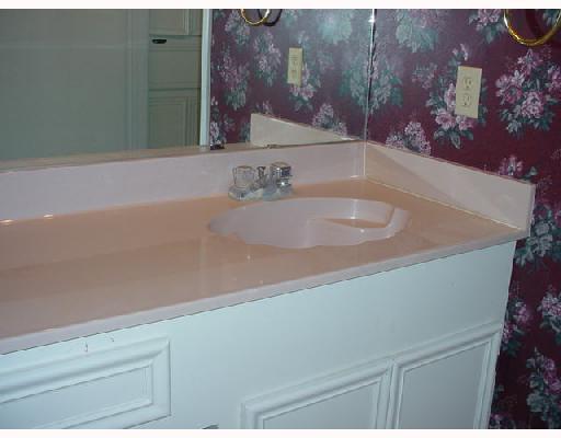 4317 Ridge View Drive Corpus Christi, TX 78413 - Photo 6 of 9 a bathroom with a sink and a mirror