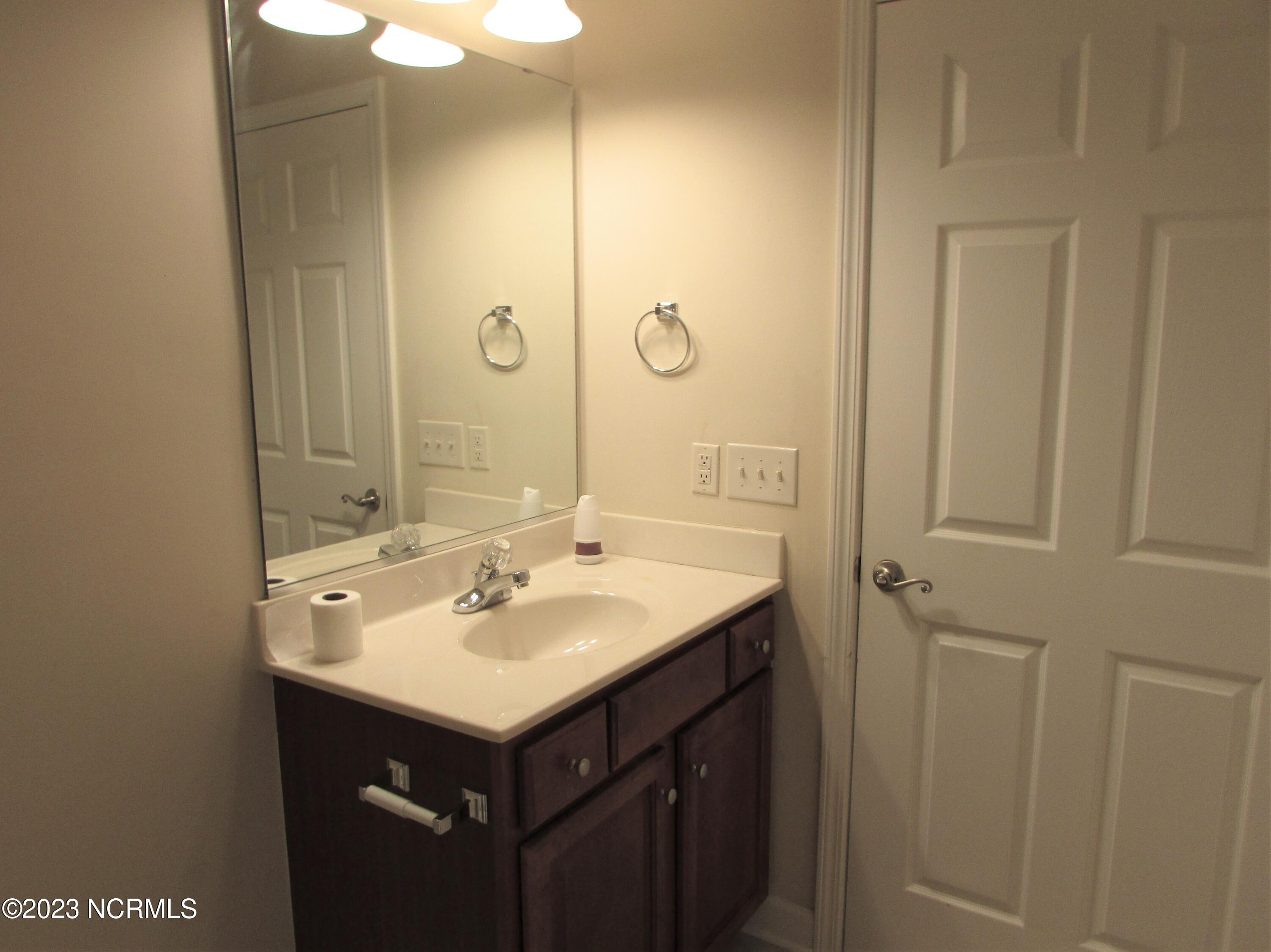 908 Resort Circle, Unit 707 Sunset Beach, NC 28468 - Photo 14 of 20 R908-707-Bathroom#1