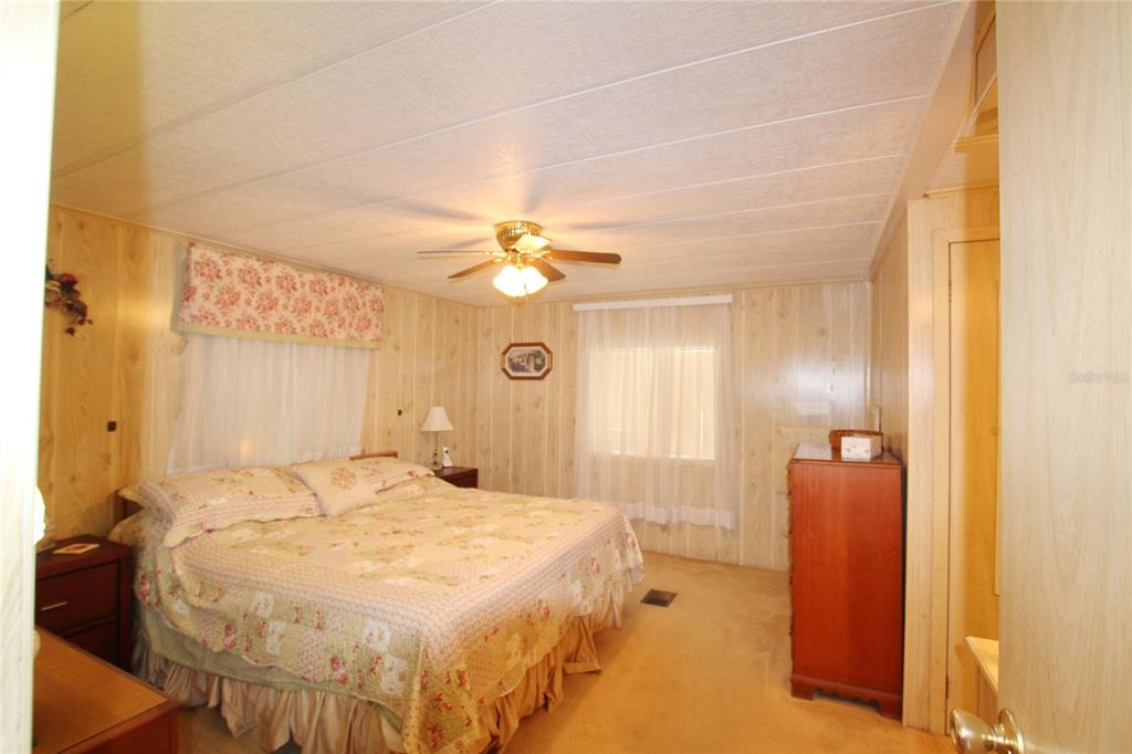 1236 Chobee Loop Okeechobee, FL 34974 - Photo 28 of 39 Primary Bedroom