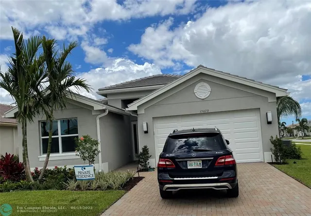 a car parked in front of a house