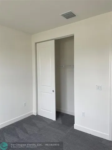 an empty room with closet