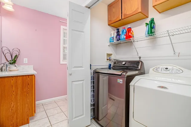 a utility room with dryer and washer