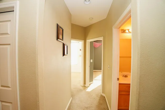 a bathroom with a window and a shower