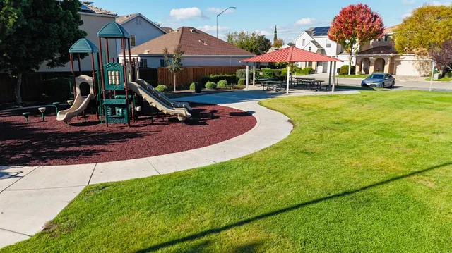 a view of a house with swimming pool