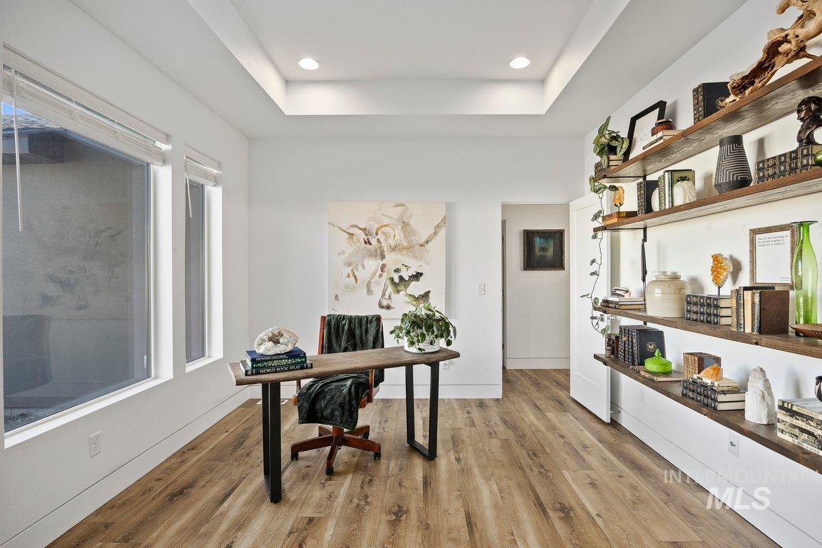 957 Birchton Loop Twin Falls, ID 83301 - Photo 15 of 40 Office area featuring a raised ceiling and light wood finished floors