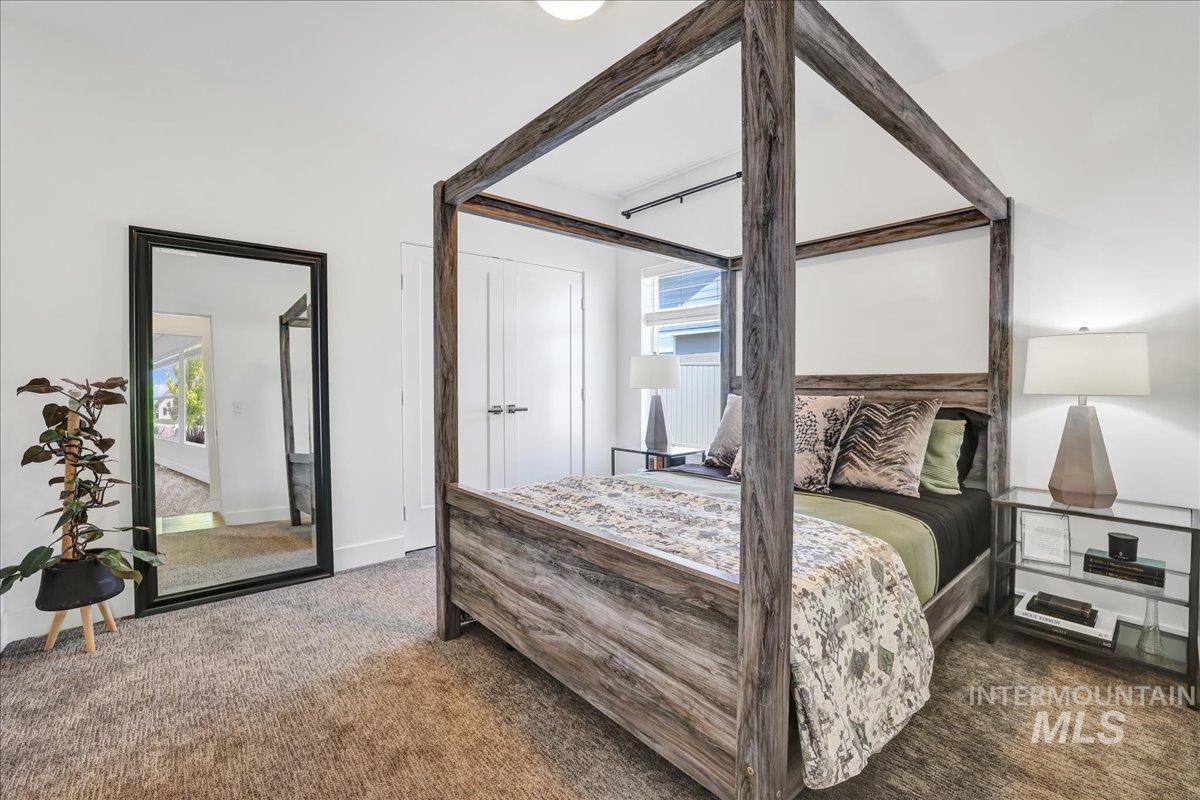 957 Birchton Loop Twin Falls, ID 83301 - Photo 22 of 32 Bedroom with carpet floors and baseboards