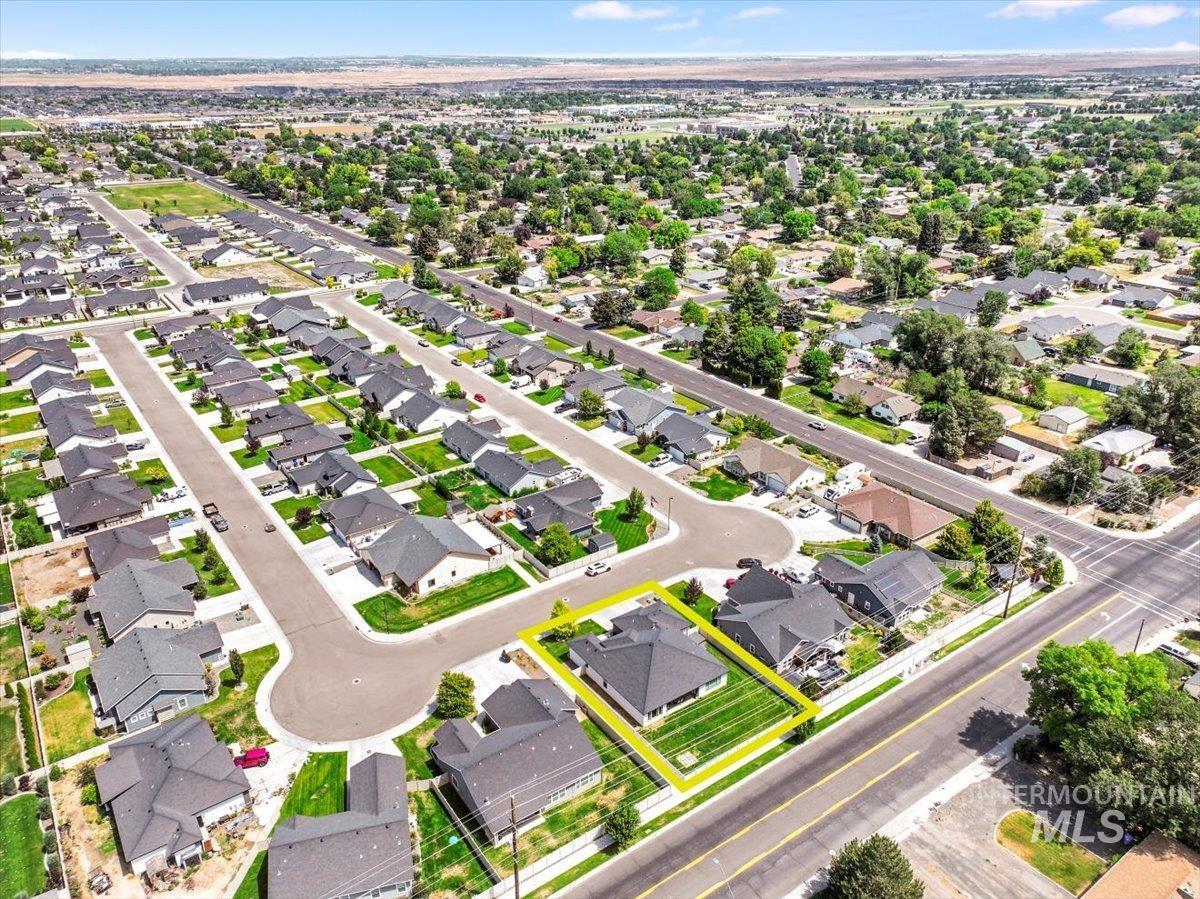 957 Birchton Loop Twin Falls, ID 83301 - Photo 30 of 32 Aerial view of residential area featuring property parcel outlined