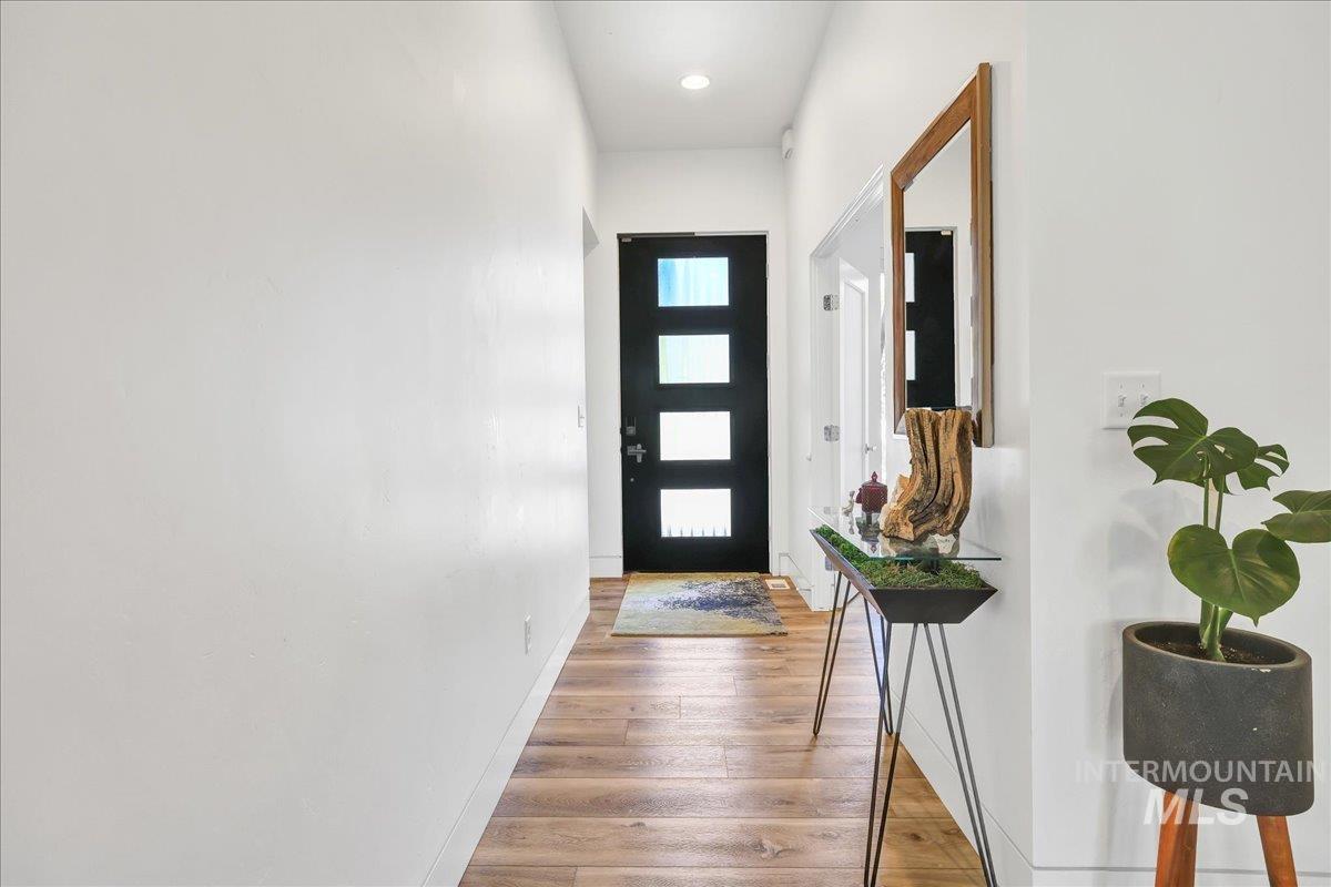 957 Birchton Loop Twin Falls, ID 83301 - Photo 4 of 32 Entryway featuring wood-type flooring and baseboards