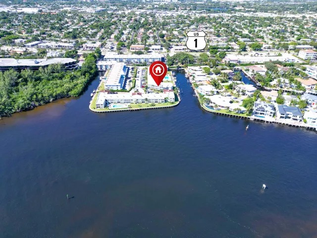 an aerial view of residential house with outdoor space and parking