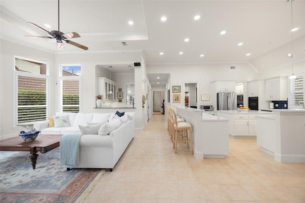 14725 Celestial Place Addison, TX 75254 - Photo 13 of 38 a living room with furniture and a large window
