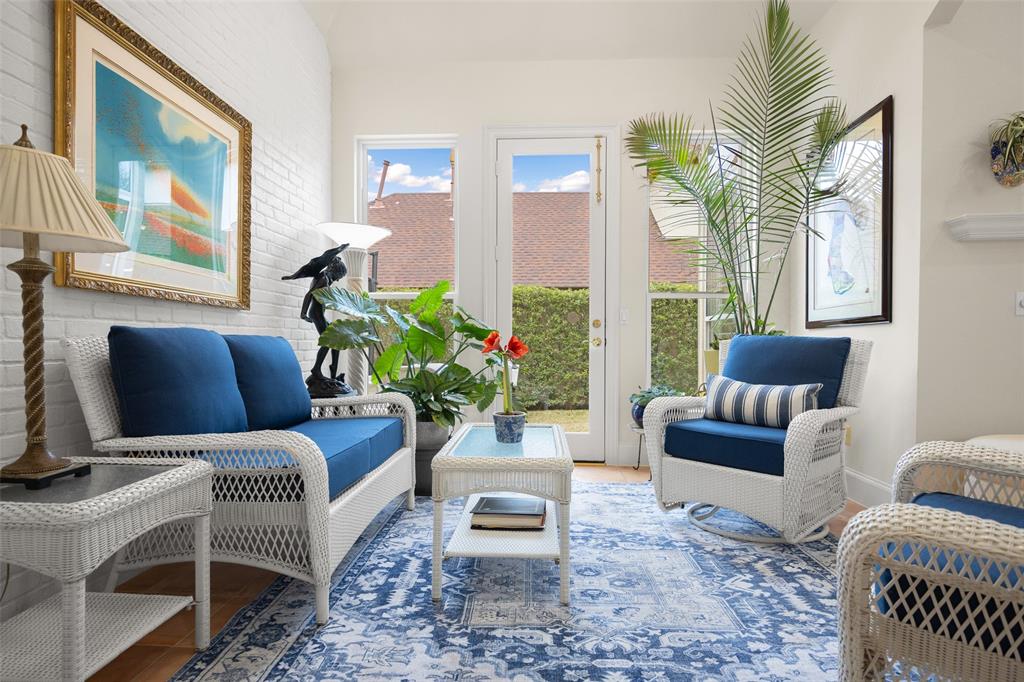 14725 Celestial Place Addison, TX 75254 - Photo 23 of 38 a living room with furniture and a large window