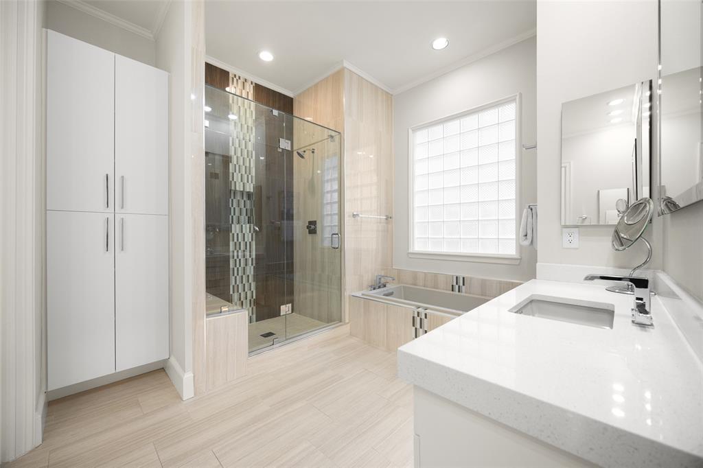 14725 Celestial Place Addison, TX 75254 - Photo 30 of 38 a bathroom with a tub sink mirror and shower