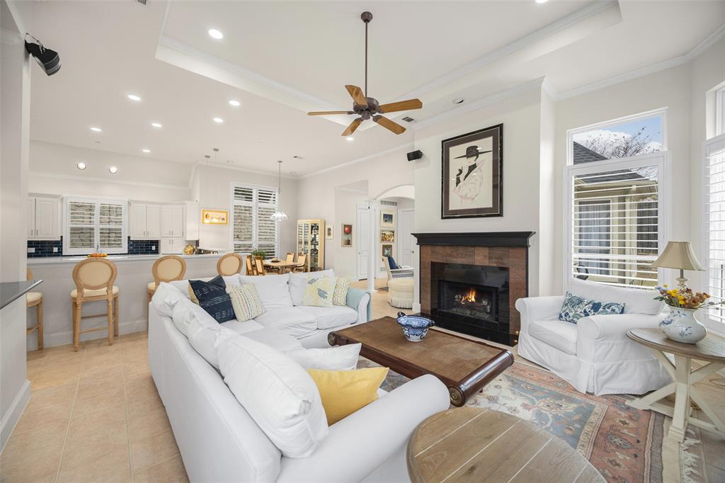 14725 Celestial Place Addison, TX 75254 - Photo 32 of 38 a living room with furniture fireplace and window