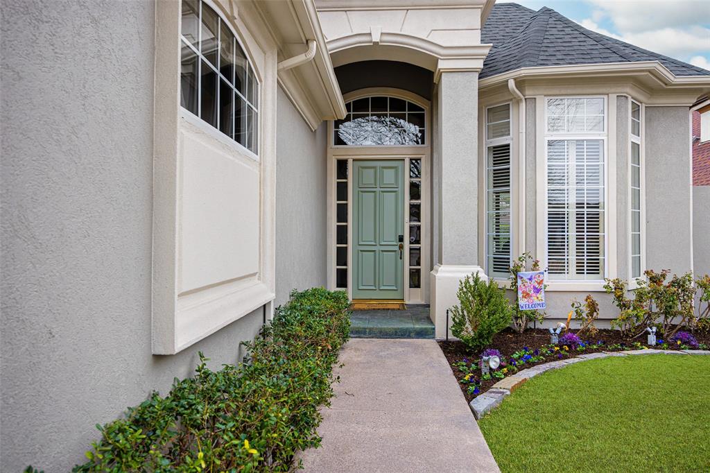 14725 Celestial Place Addison, TX 75254 - Photo 4 of 38 a front view of a house with a yard