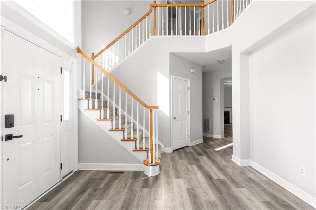 3522 Hunting Ridge Drive High Point, NC 27265 - Photo 4 of 38 Entryway with Balcony Looking Over Foyer
