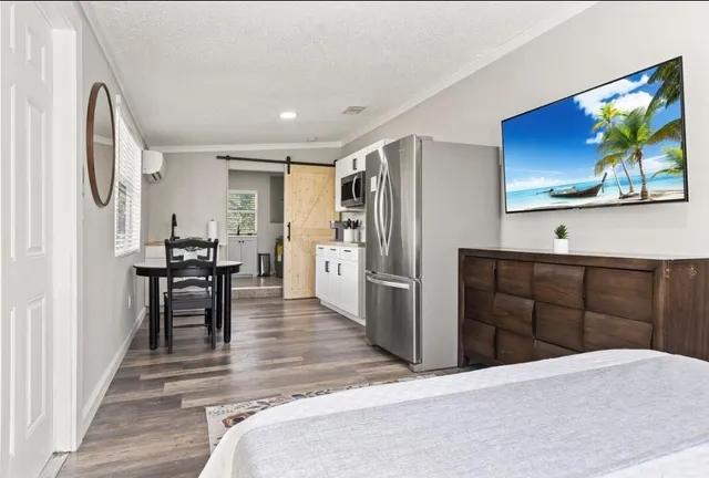 a view of a kitchen from the hallway