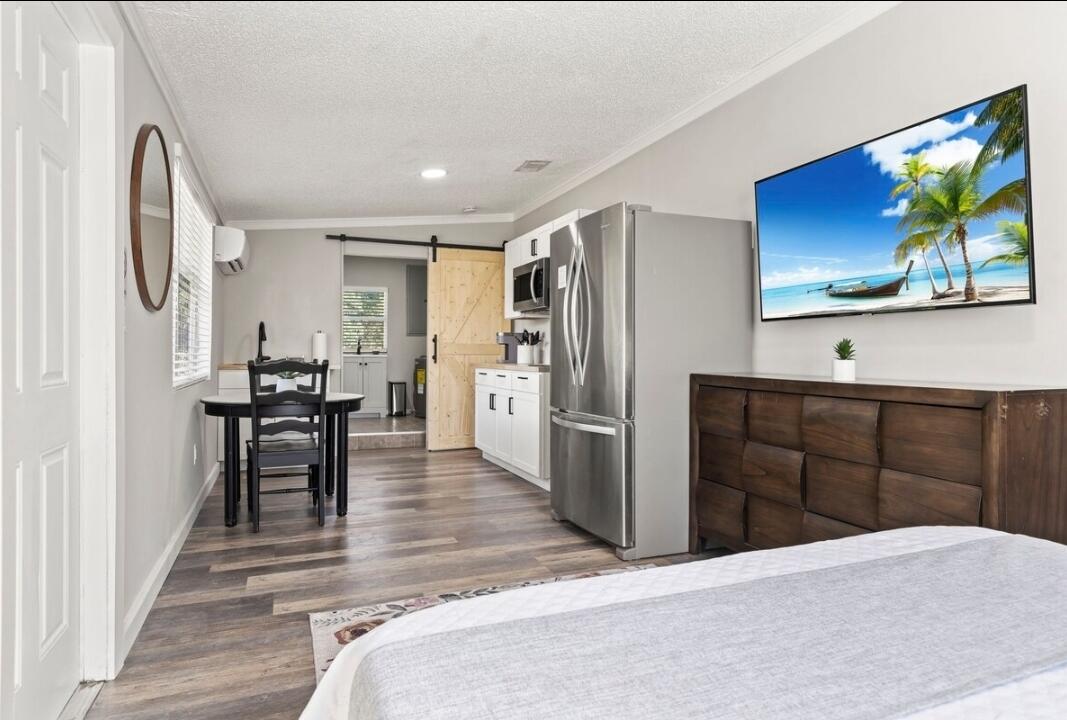 5607 Tangelo Drive Fort Pierce, FL 34982 - Photo 4 of 10 a view of a kitchen from the hallway