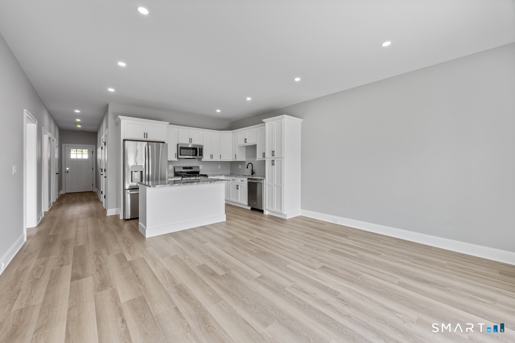 210 Munson Road, Unit 1B Wolcott, CT 06716 - Photo 8 of 28 Kitchen view of Living room