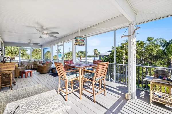 a kitchen with stainless steel appliances wooden cabinets a stove a sink and a window