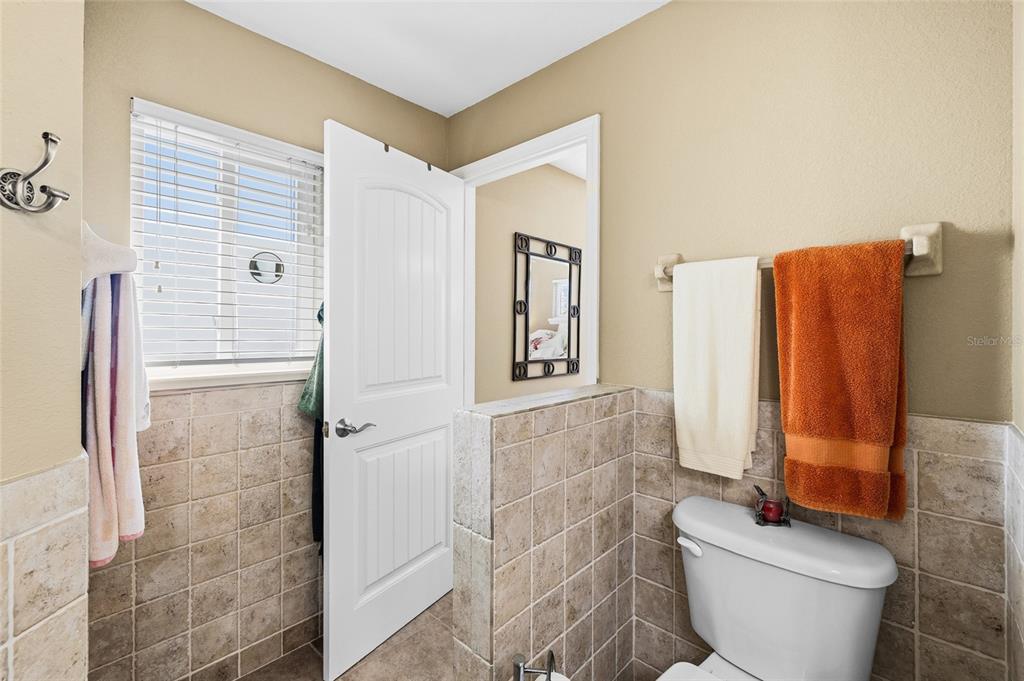8550 Little Gasparilla Placida, FL 33946 - Photo 30 of 62 a bathroom with a toilet and shower
