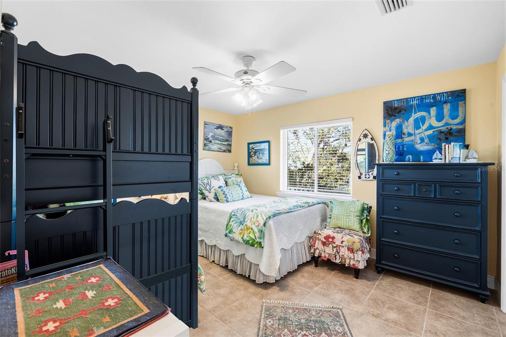 8550 Little Gasparilla Placida, FL 33946 - Photo 31 of 62 a bedroom with furniture and a window