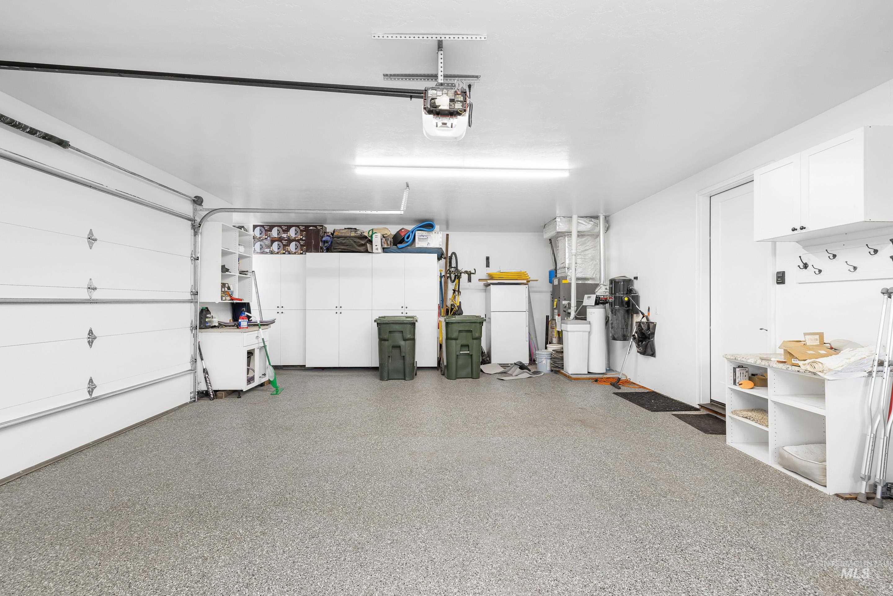 3672 West Red Jade Court Meridian, ID 83646 - Photo 37 of 50 Garage with heating unit and a garage door opener