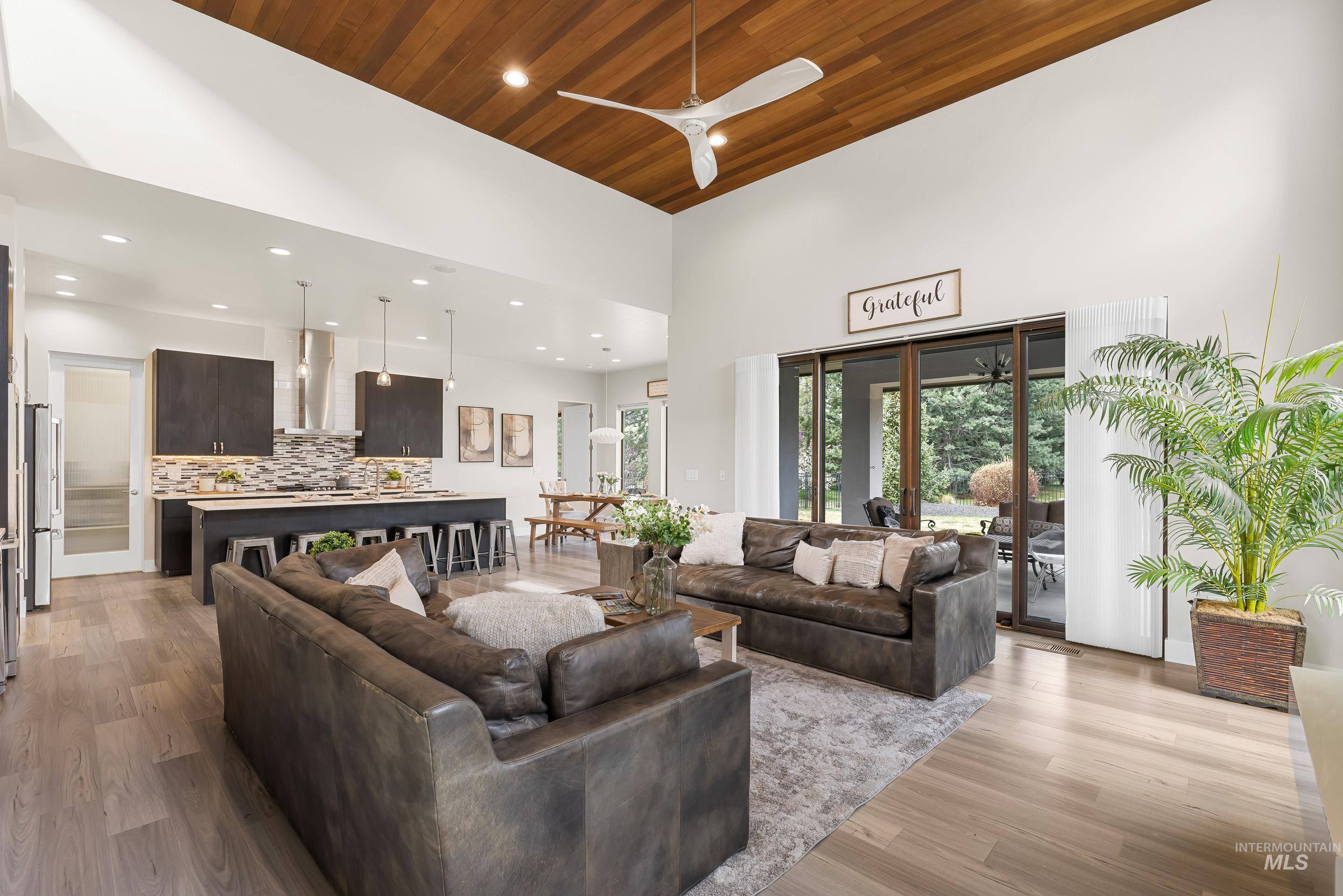 3672 West Red Jade Court Meridian, ID 83646 - Photo 7 of 50 Living room featuring a high wooden ceiling, light wood-style floors, recessed lighting, and a ceiling fan