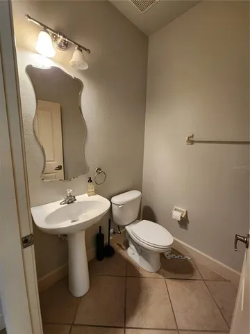 a view of a kitchen that has a window