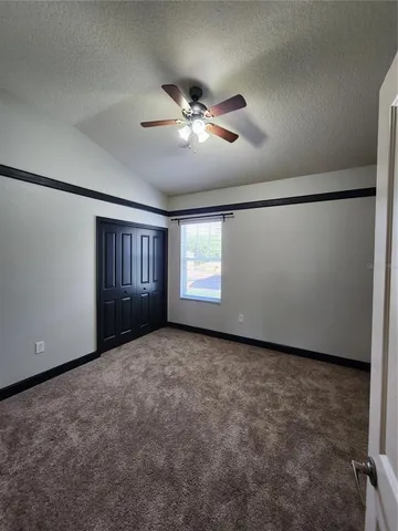 a bathroom with a double vanity sink and mirror