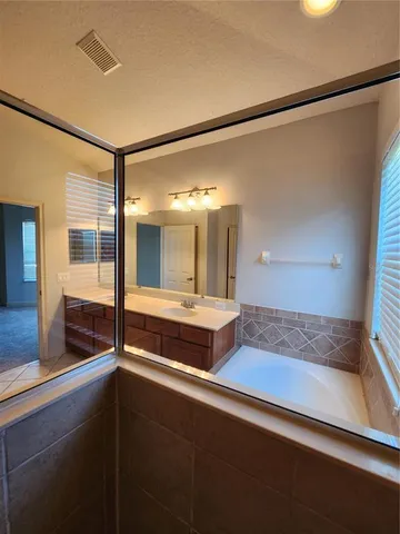 a view of lake with green space