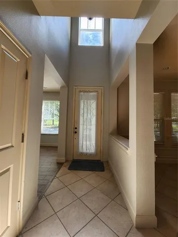 a view of an entryway of a house and an entryway of the house