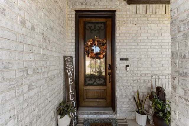 a front view of a house with an outdoor space