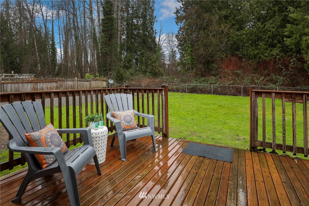 22515 20th Avenue Southeast Bothell, WA 98021 - Photo 30 of 34 a view of a chairs on wooden deck