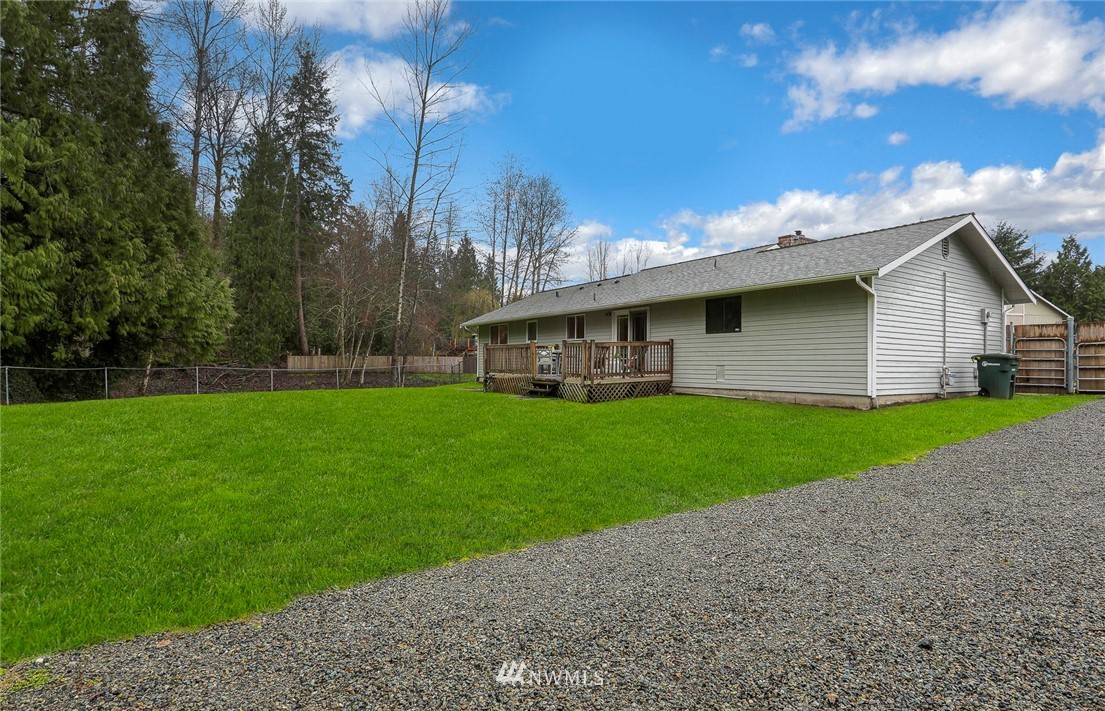 22515 20th Avenue Southeast Bothell, WA 98021 - Photo 32 of 34 a front view of house with a garden