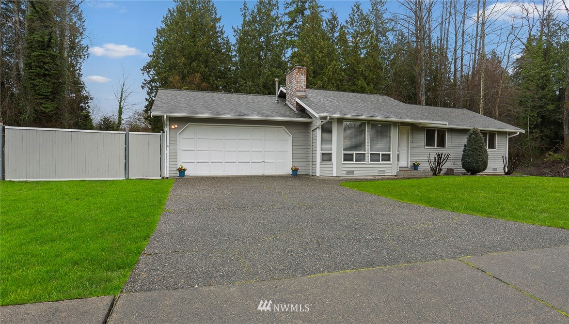 22515 20th Avenue Southeast Bothell, WA 98021 - Photo 34 of 34 a front view of house with yard and green space