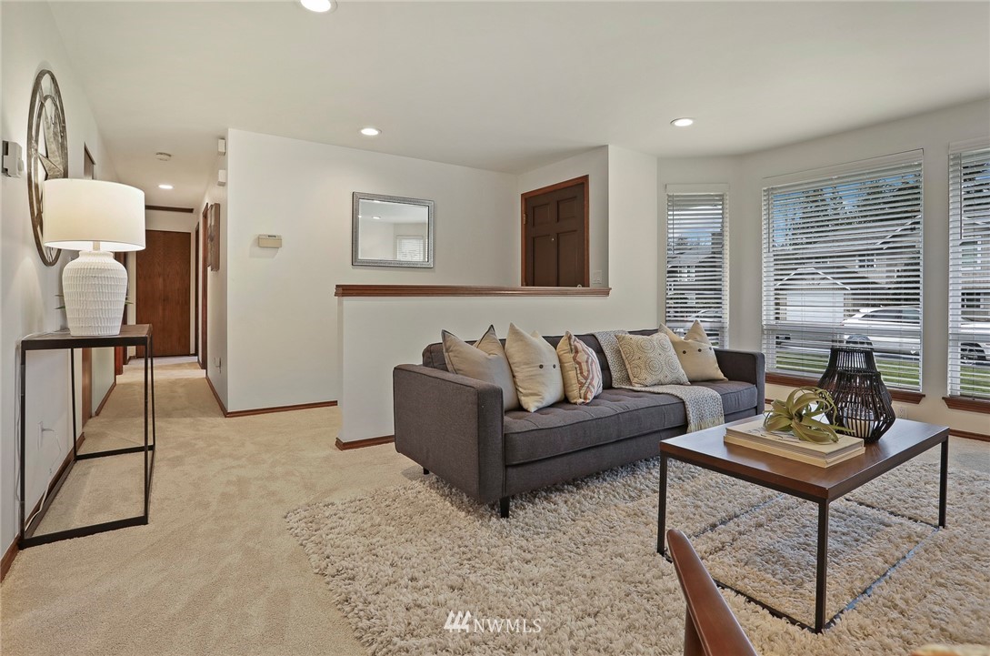 22515 20th Avenue Southeast Bothell, WA 98021 - Photo 4 of 34 a living room with furniture and a window