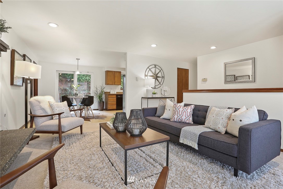 22515 20th Avenue Southeast Bothell, WA 98021 - Photo 6 of 34 a living room with furniture and a large window