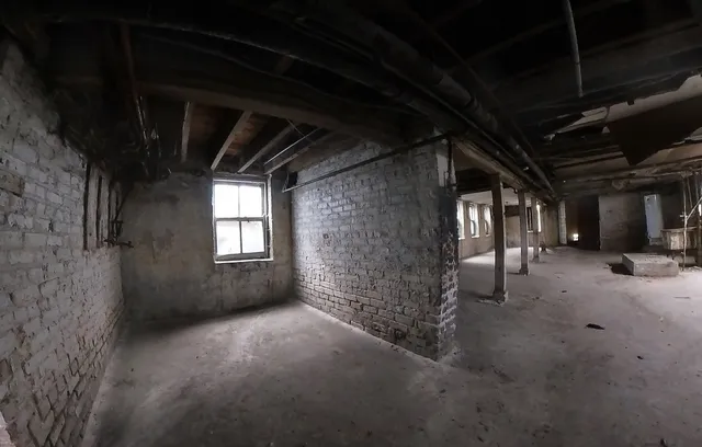 a view of water heater room with window