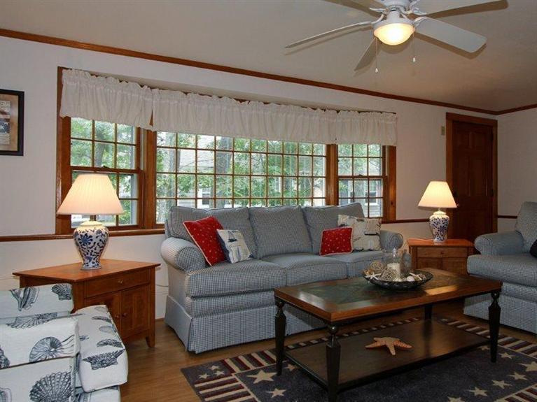 26 Grey Neck Road, Unit 2 West Harwich, MA 02671 - Photo 3 of 19 a living room with furniture and a large window