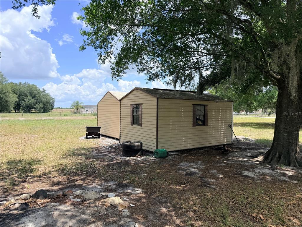 33 Ridge Road Frostproof, FL 33843 - Photo 17 of 21 a view of a house with backyard