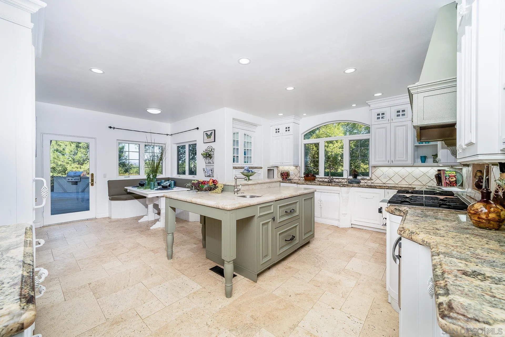 5 Rollingview Lane Fallbrook, CA 92028 - Photo 16 of 74 a kitchen with a stove and a view of living room