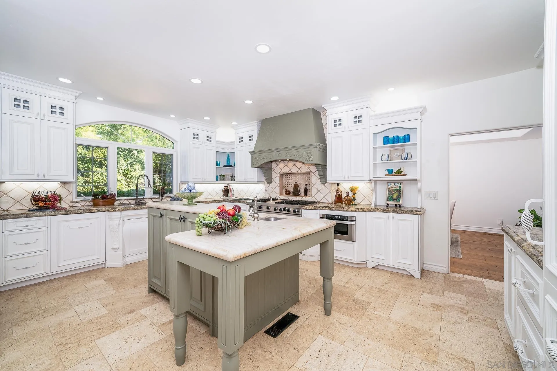 5 Rollingview Lane Fallbrook, CA 92028 - Photo 17 of 74 a kitchen with a sink stove and cabinets