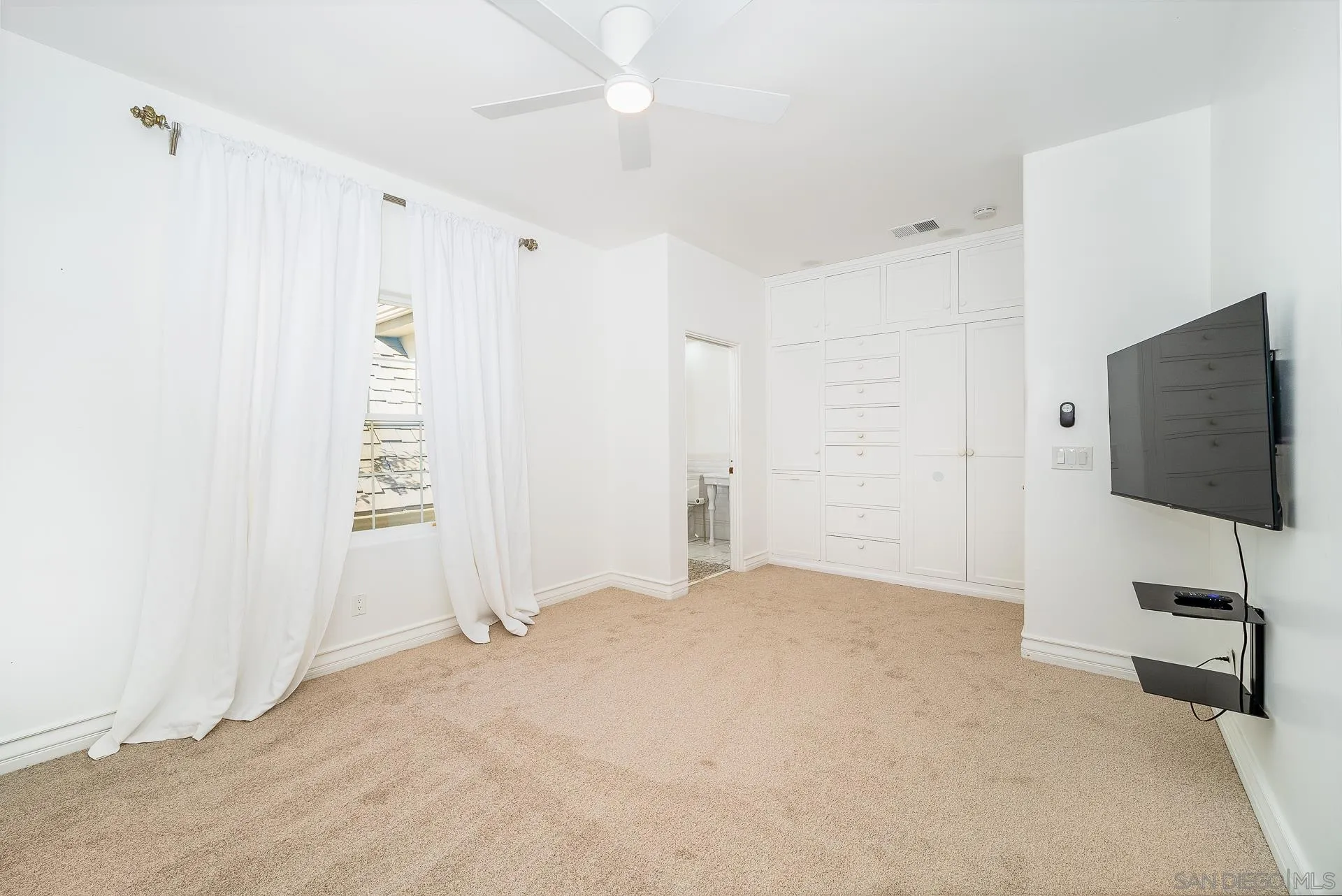 5 Rollingview Lane Fallbrook, CA 92028 - Photo 50 of 74 a view of an empty room with a window