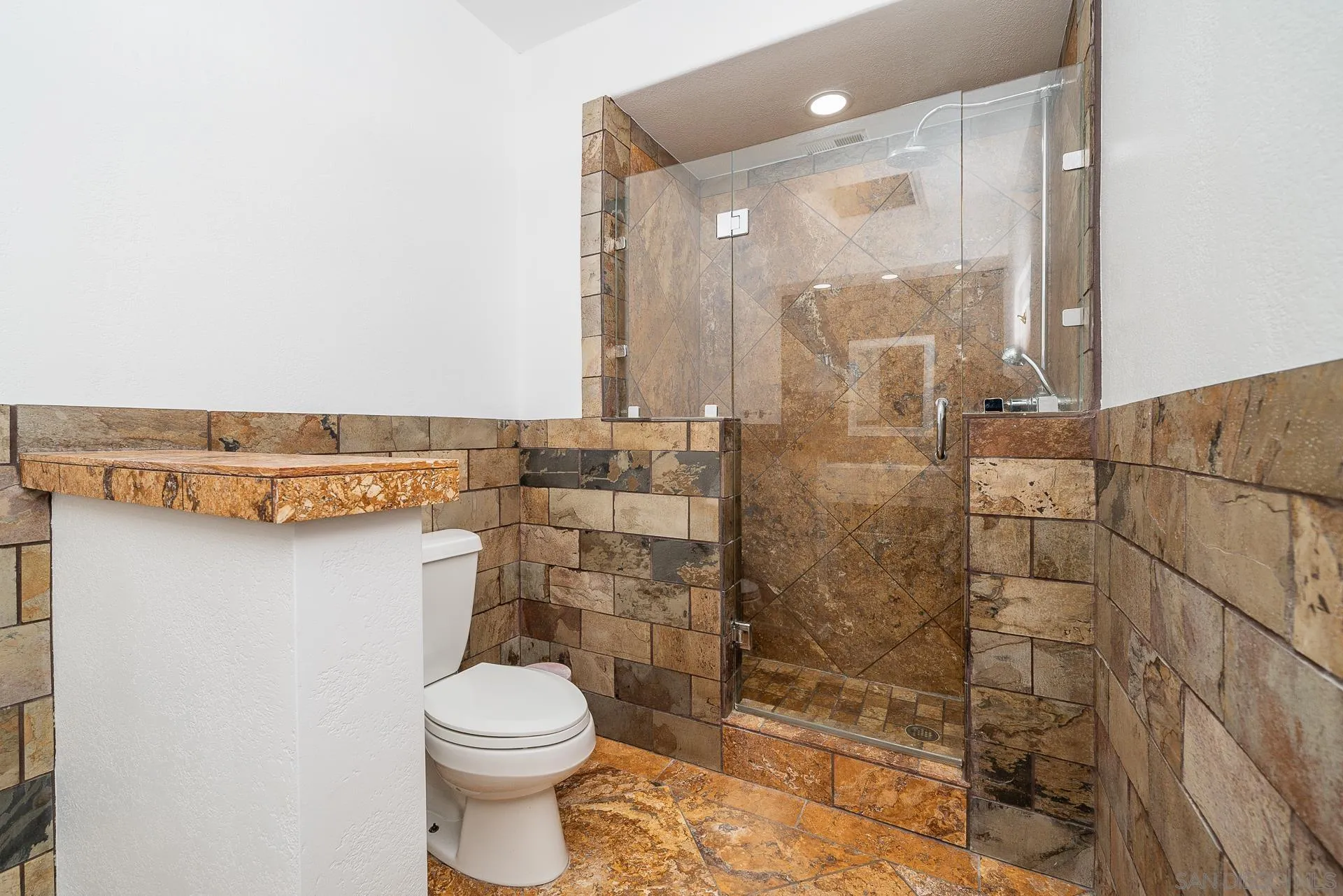 5 Rollingview Lane Fallbrook, CA 92028 - Photo 54 of 74 a bathroom with a toilet and a shower