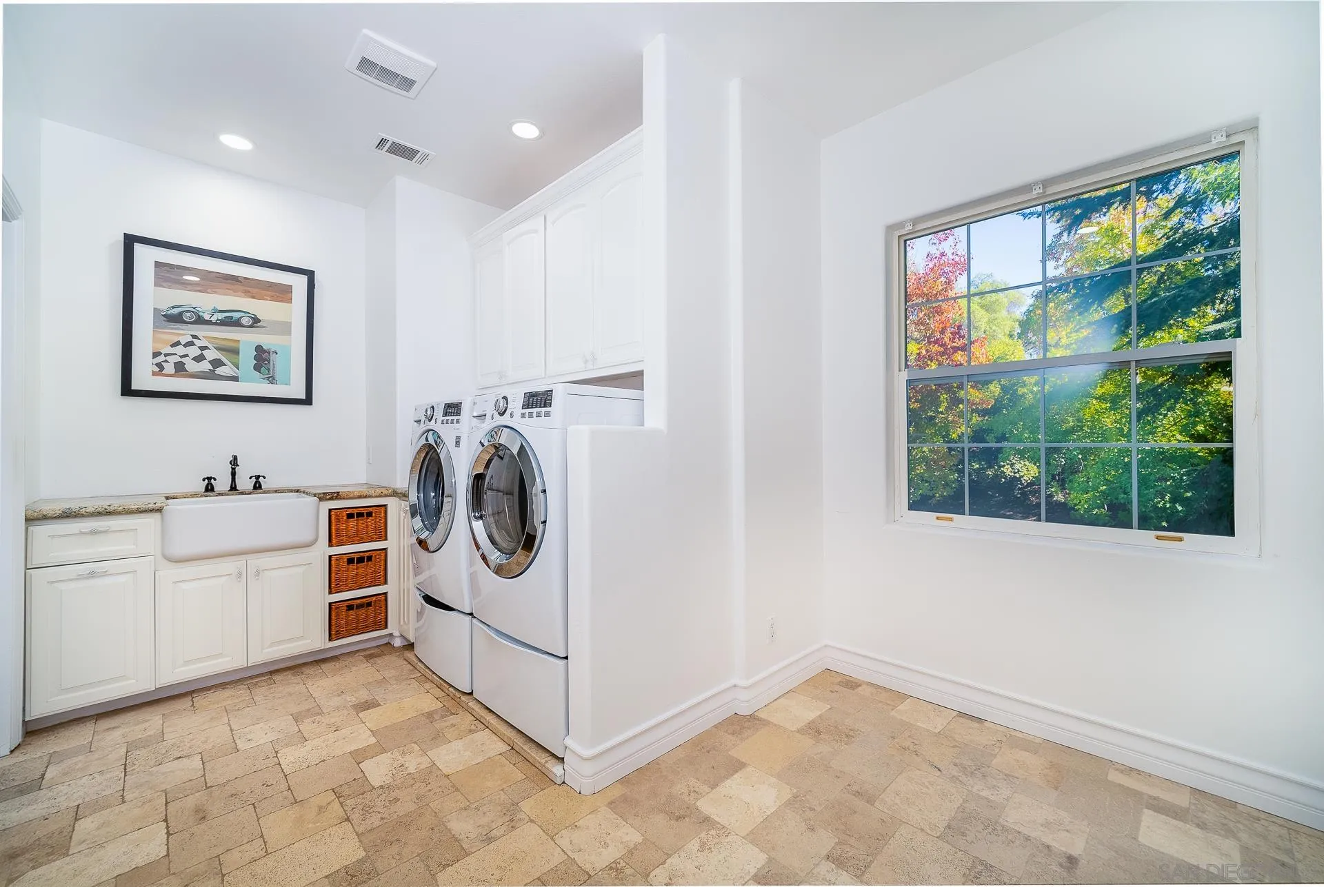 5 Rollingview Lane Fallbrook, CA 92028 - Photo 62 of 74 a view of a storage & utility room with washer and dryer