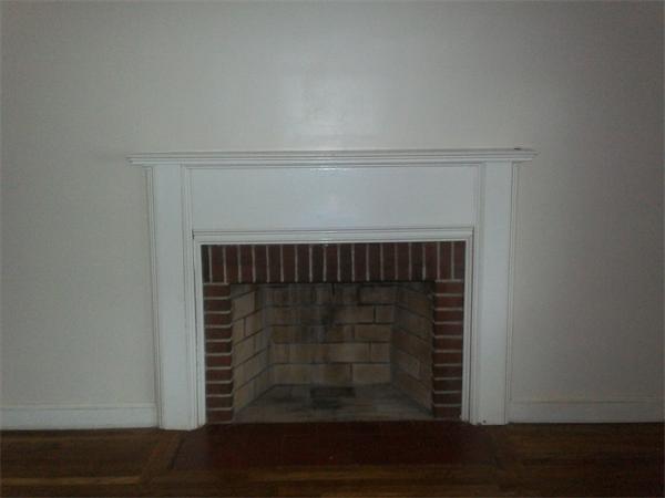 40 Franklin Road Norwell, MA 02061 - Photo 3 of 5 a close view of fireplace and wooden floor