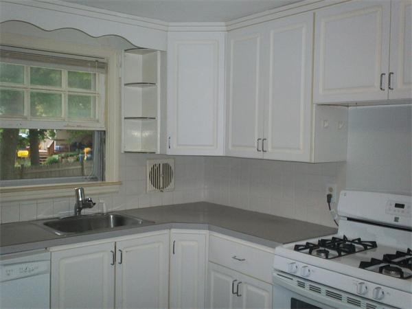 40 Franklin Road Norwell, MA 02061 - Photo 5 of 5 a kitchen with granite countertop a sink and cabinets