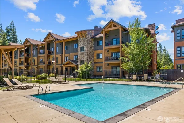 a view of a building with a swimming pool