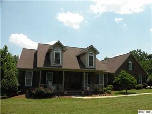 220 Abner Road Stony Point, NC 28678 - Photo 1 of 16 a front view of house with yard and green space